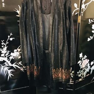 Black dress with overcoat.